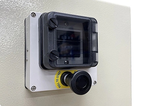 a close up of a wall mounted decanting unit
