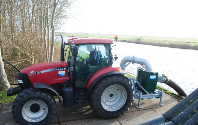 image of the B300 T3WGT on a tractor, pumping from a lake
