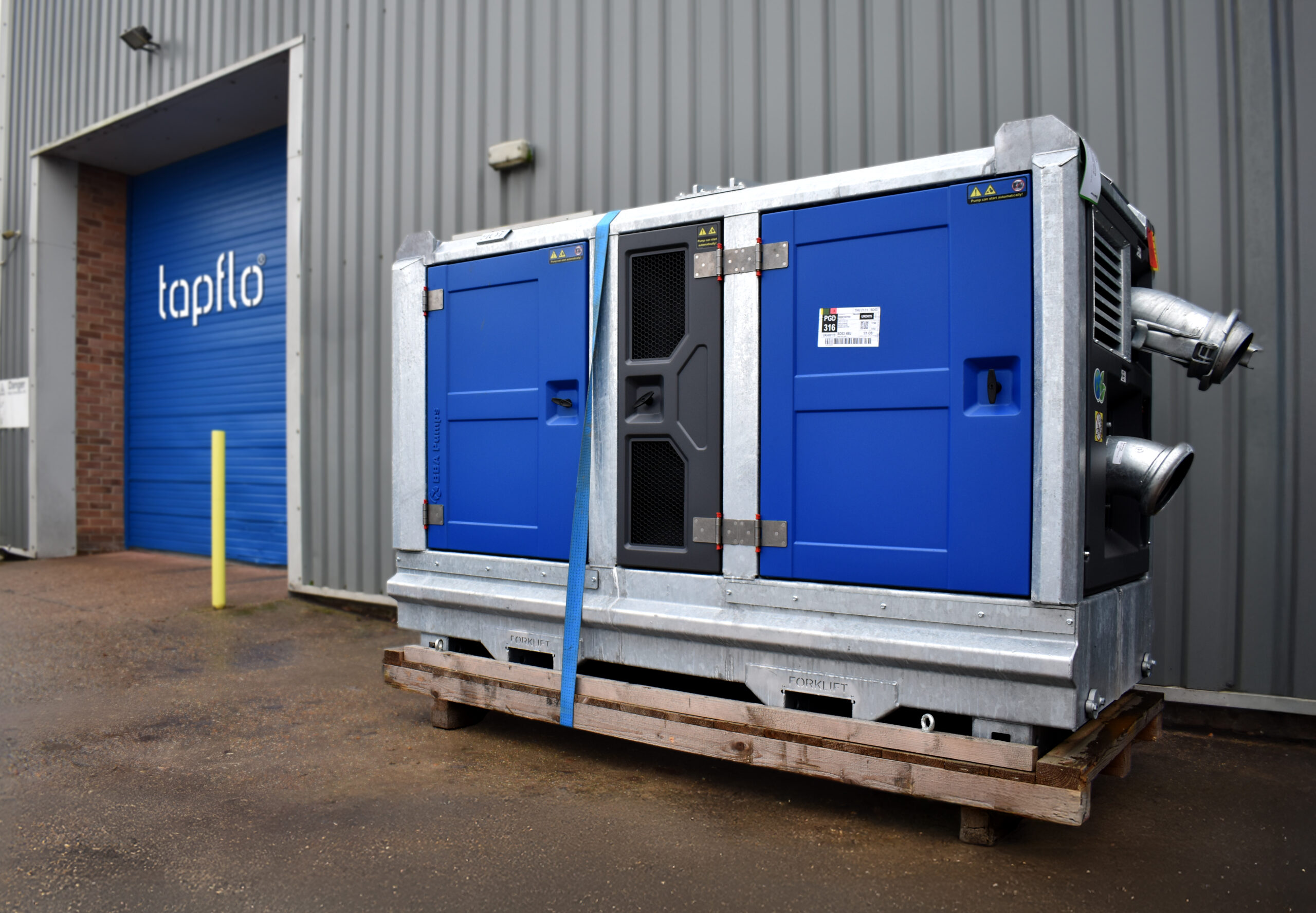 A picture of our BBA Diesel Unit in front of our Warehouse