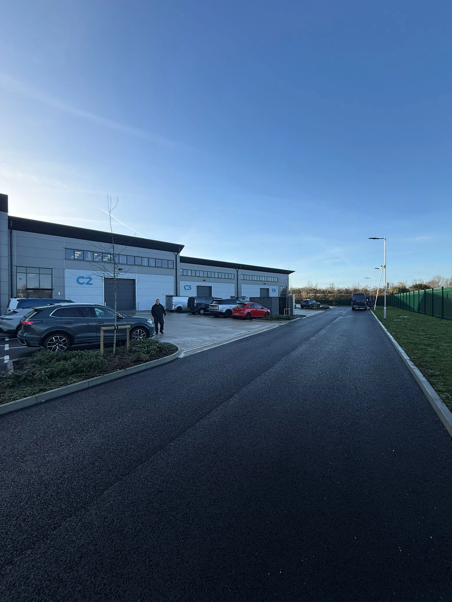 outside of new TS group facility with blue sky