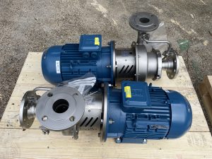 A picture of 2 self priming high performance centrifugal pumps on a crate